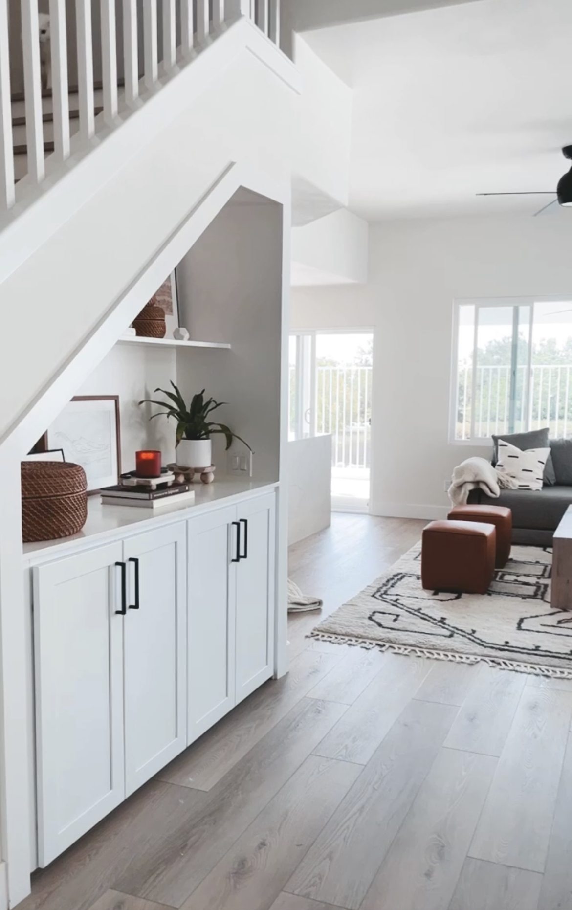 built-in storage under stairs