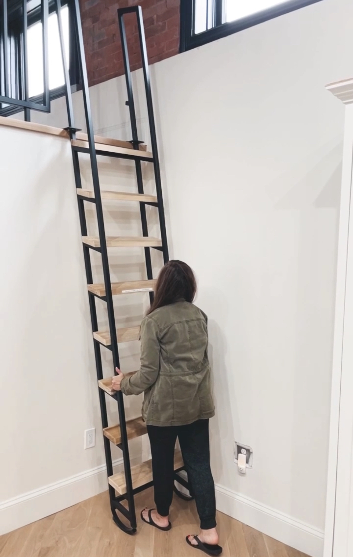 space saving retracting loft ladder